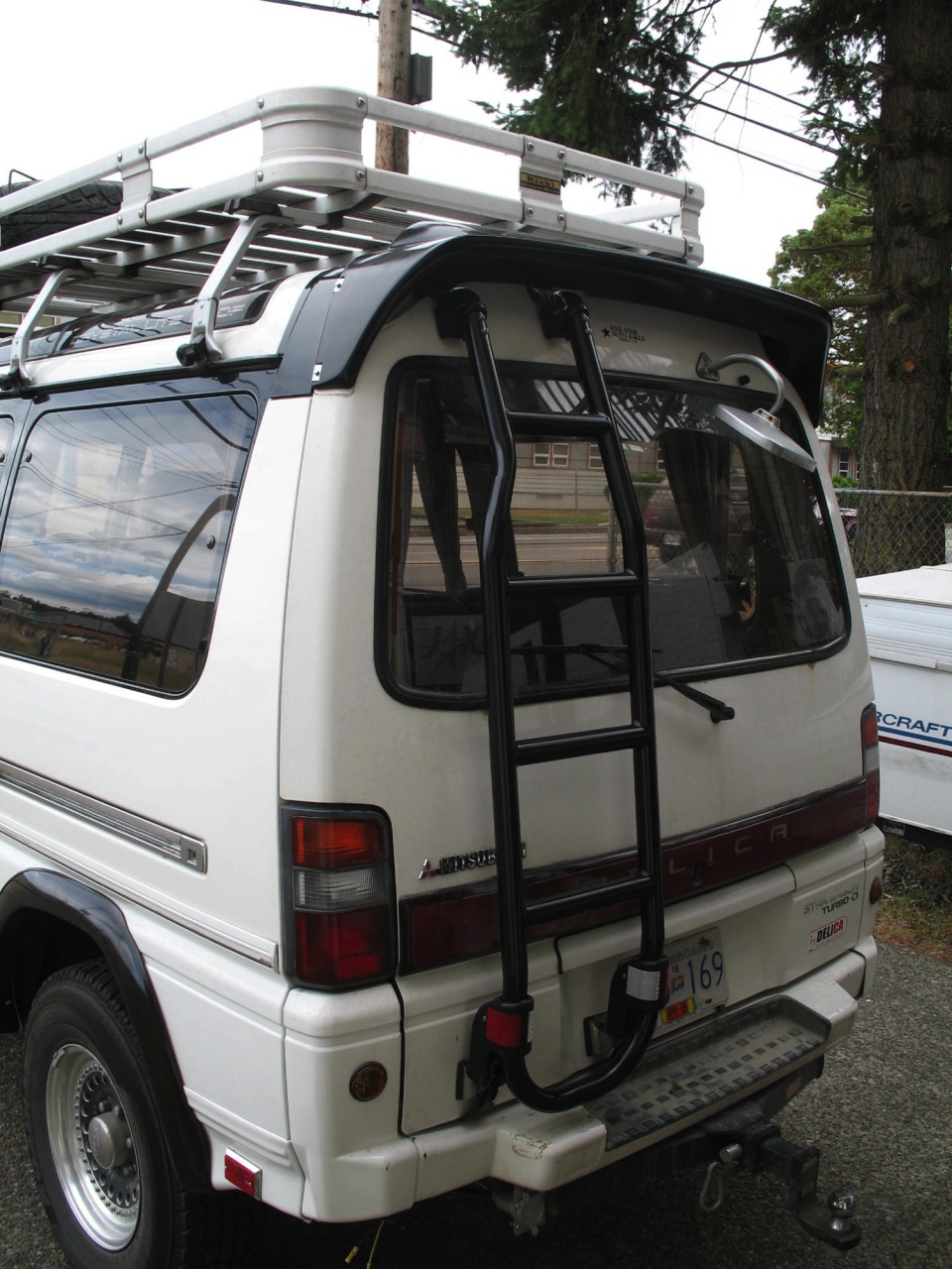 The repainted ladder and the reinstallation of the spoiler. Oh ya, baby!