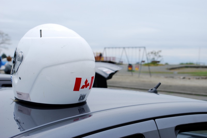 Mitsuflag on the Mitsubishi service guy's racing helmet