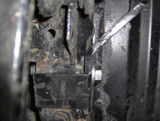 note the flange plate at the very bottom of the picture, just above the half of a bolt.