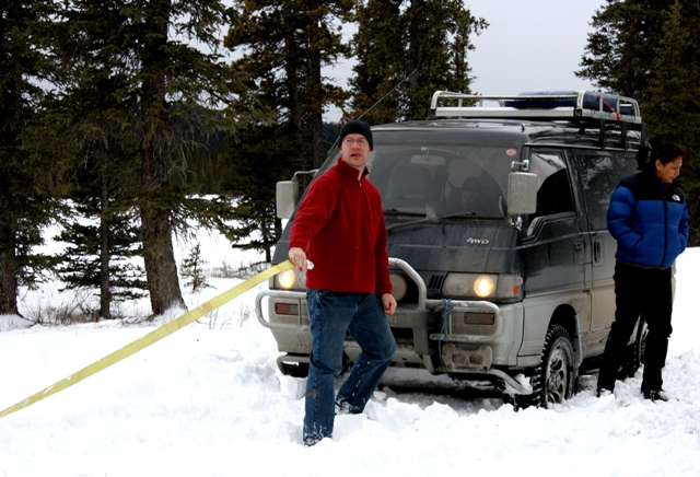 Yet another happy Delica owner... John buries his bus in a drifted area and prepares for recovery.