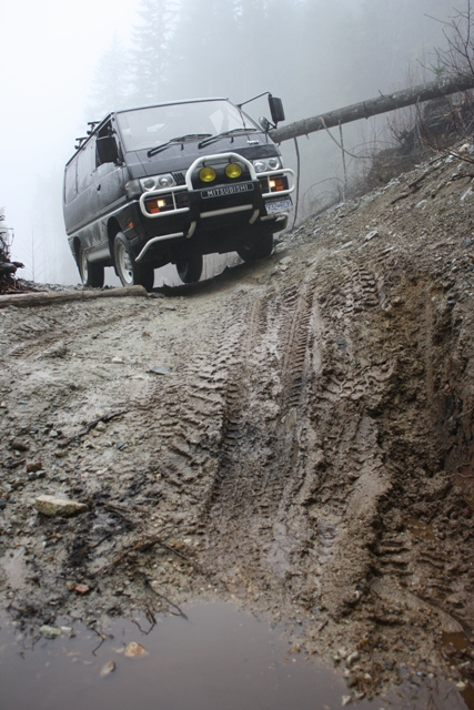 My cousin Brian going into a very large cross ditch.