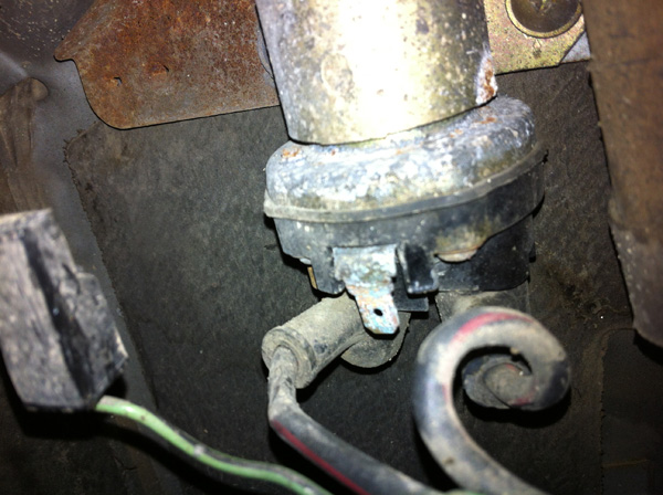 The Glow Plug Relay is located in the hatch behind the right-hand seat, along with the power steering fluid.