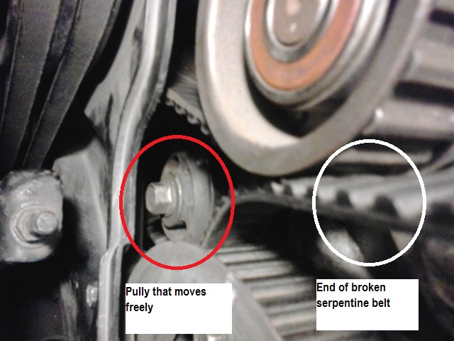 Pulley picture 2 showing broken serpentine belt 2.jpg