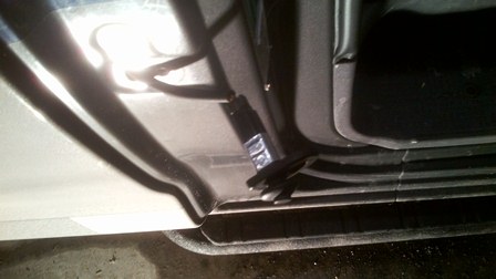 Pull the switch out and tape the wire to door jam.