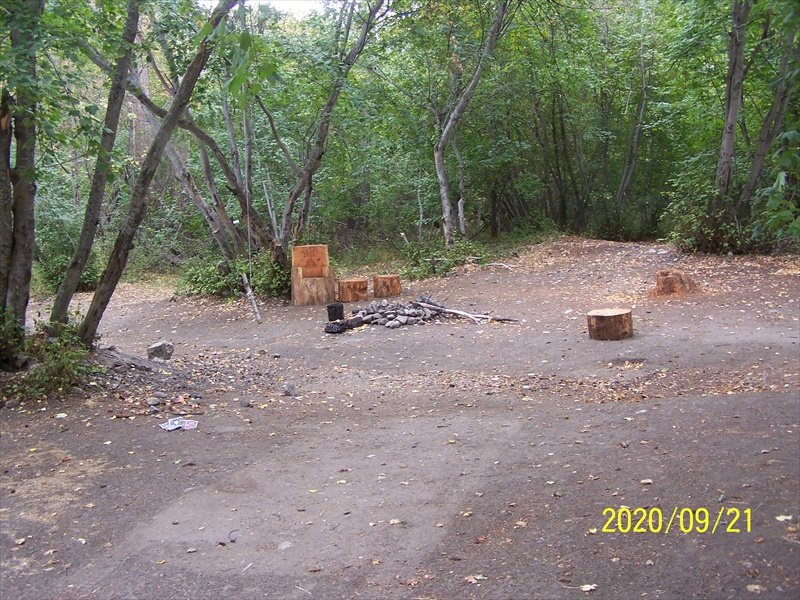 Deluxe site c/w chair and fire pit