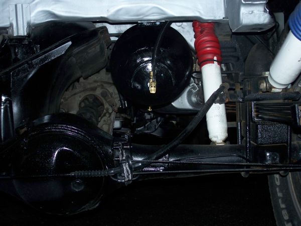 semi trailer air tank now where muffler was.jpg