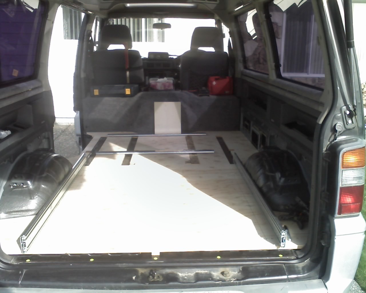 A start, the cutouts are for the seat slides and the slides are for the camping organizing. They are 3' 100 lbs and 4' 200 lbs slides.