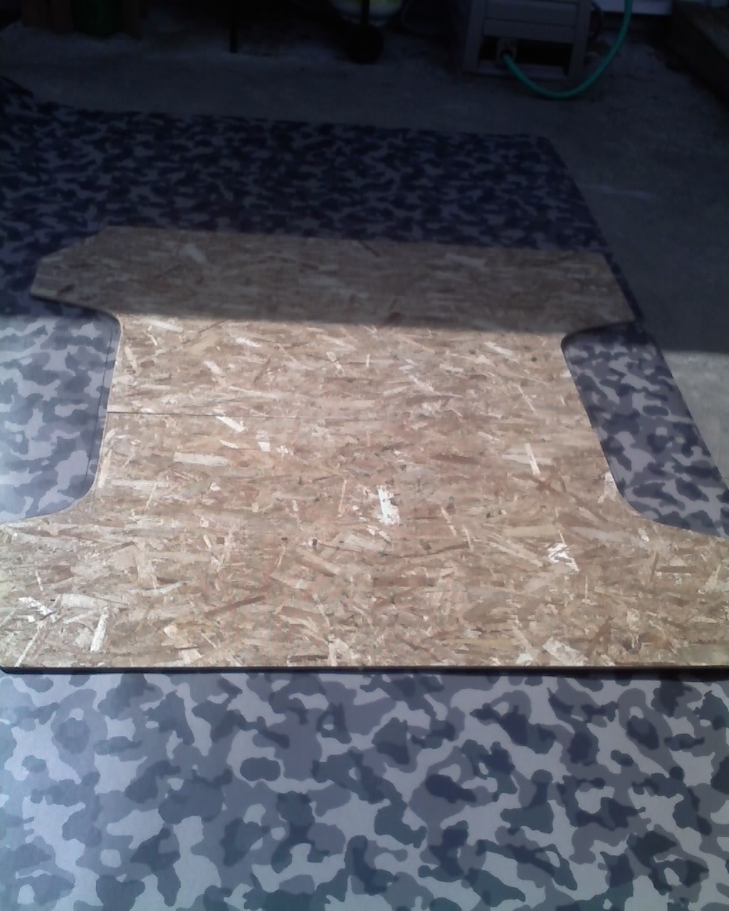 Floor template and lino flooring. The template will also be used for extra protection for hauling the garbage.