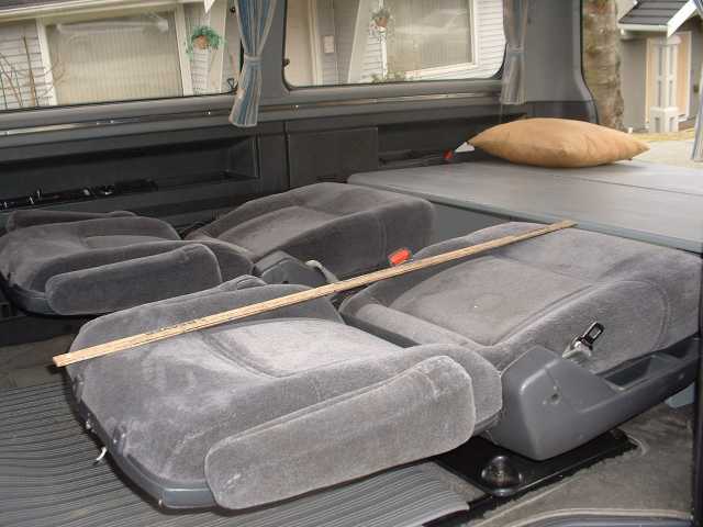 2 metres total bed length. Note seat belt  ends on wheel arch could anchor box.