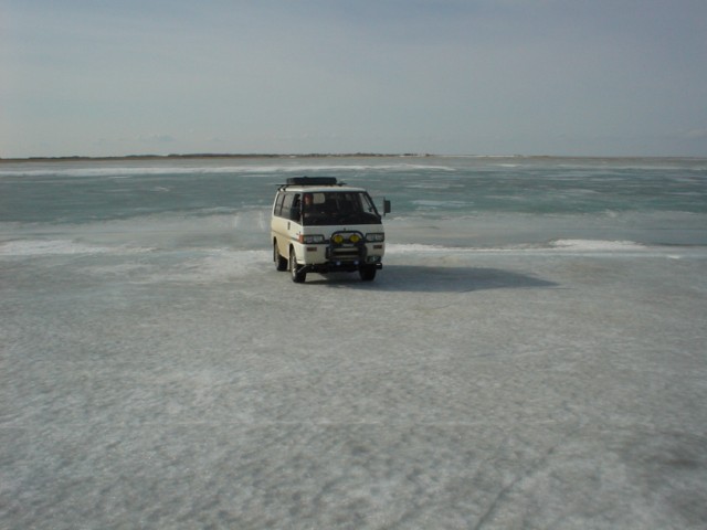 I said, go on shore and take a picture in case something spectacular happens. Nothing did. The little stream around the edge of the ice wasn't .. well dangerous :(  Some spots the ice was pretty thin at the edge.